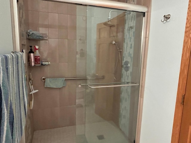 bathroom featuring a stall shower