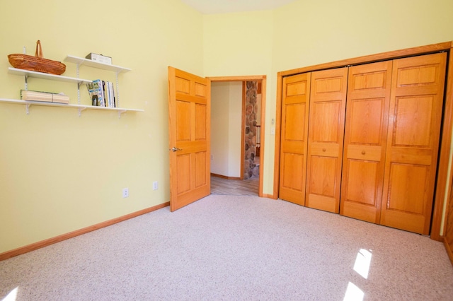 15633 Explorer Ln, Park Rapids, MN 56470 - unfurnished bedroom featuring carpet, a towering ceiling, baseboards, and a closet