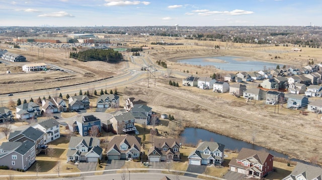 aerial view with a water view and a residential view