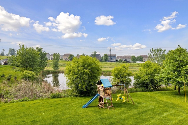 4520 Bailey Lake Dr, Woodbury, MN 55129 - view of grassy yard featuring a playground and a water view