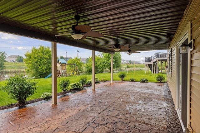 4520 Bailey Lake Dr, Woodbury, MN 55129 - view of patio / terrace featuring ceiling fan and a playground