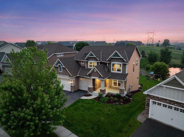 4520 Bailey Lake Dr, Woodbury, MN 55129 - craftsman inspired home with board and batten siding, driveway, and stone siding