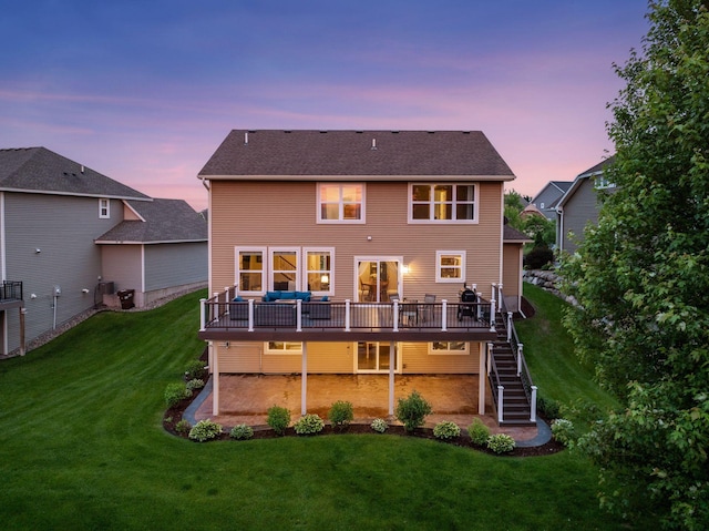 4520 Bailey Lake Dr, Woodbury, MN 55129 - rear view of property featuring stairway, a deck, and a lawn