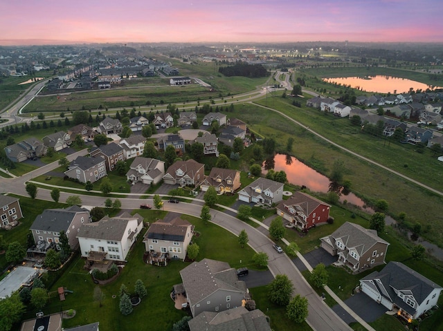 4520 Bailey Lake Dr, Woodbury, MN 55129 - aerial view at dusk of a water view and a residential view