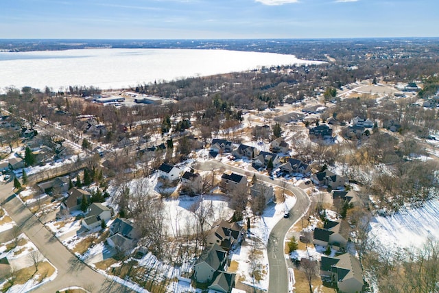 bird's eye view featuring a residential view and a water view