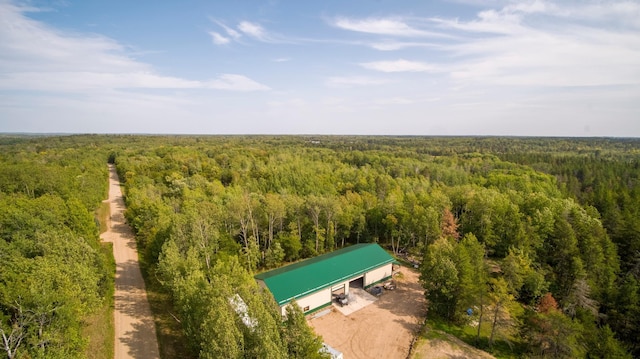 bird's eye view featuring a forest view