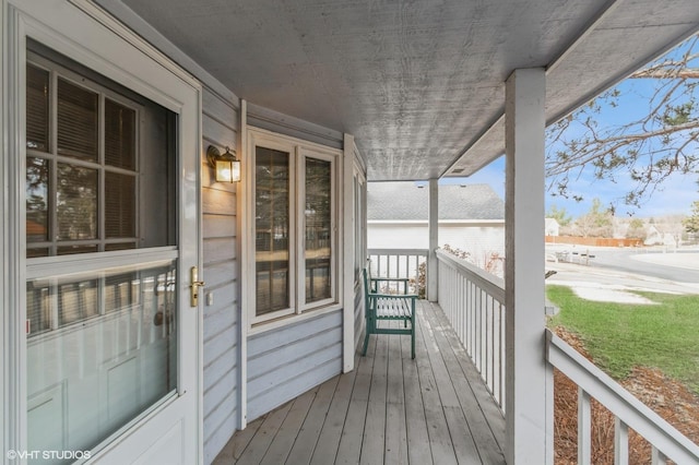 wooden deck featuring a porch