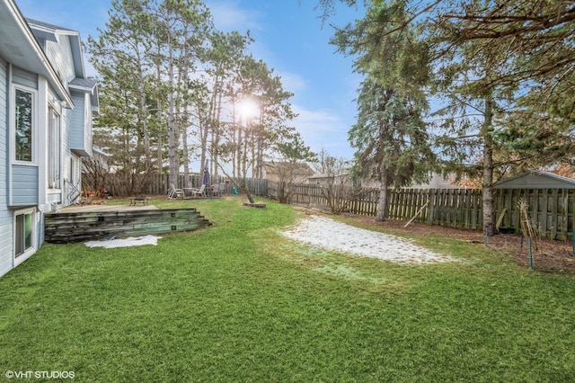 view of yard with a fenced backyard