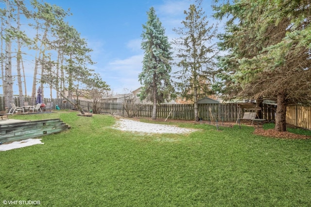 view of yard featuring a fenced backyard