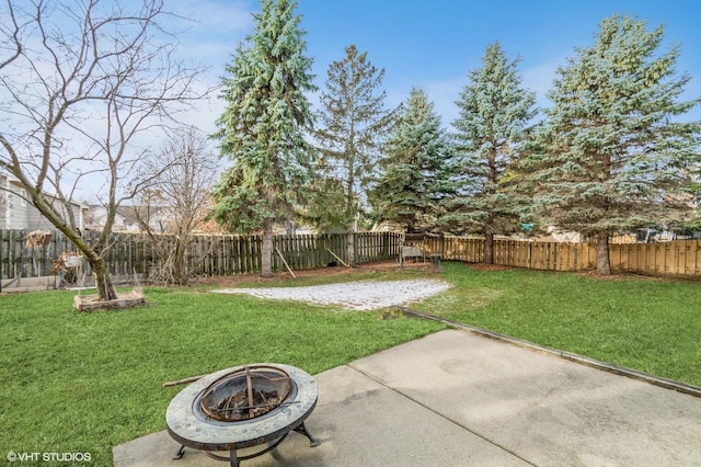 view of yard featuring a patio and a fenced backyard