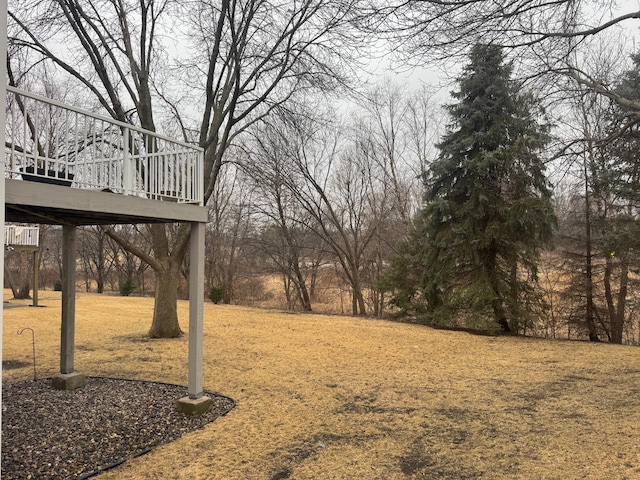 view of yard with a wooden deck