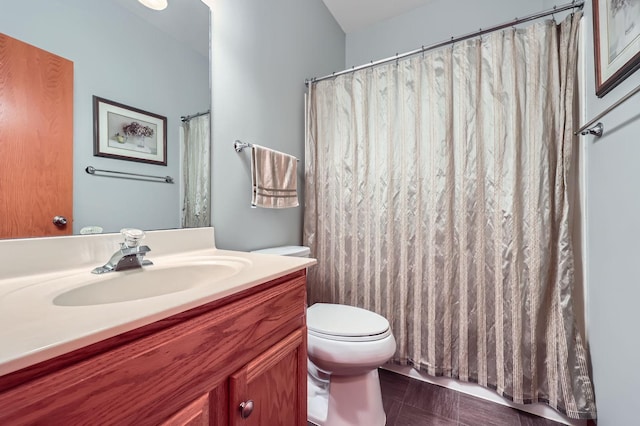 bathroom with a shower with shower curtain, toilet, and vanity