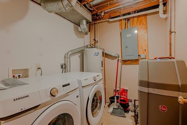 washroom with electric panel and separate washer and dryer