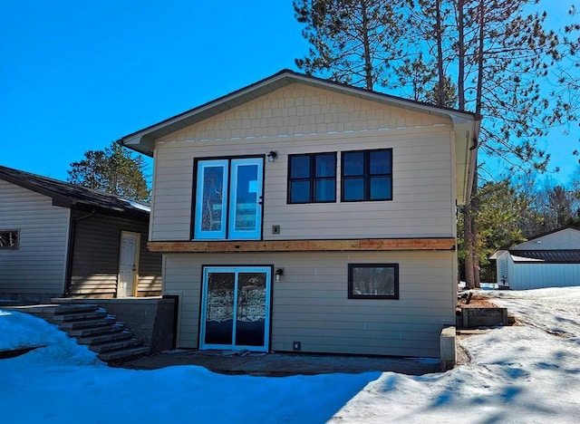 view of snow covered property