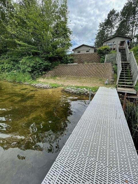 view of dock with stairway