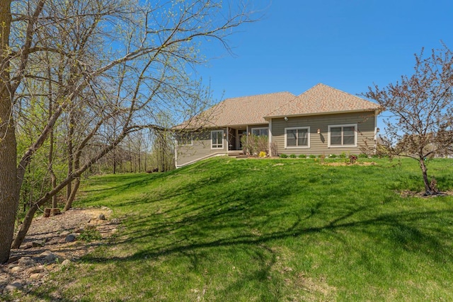 view of front of property with a front lawn