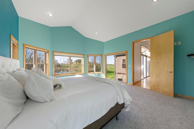 carpeted bedroom with multiple windows, high vaulted ceiling, baseboards, and recessed lighting
