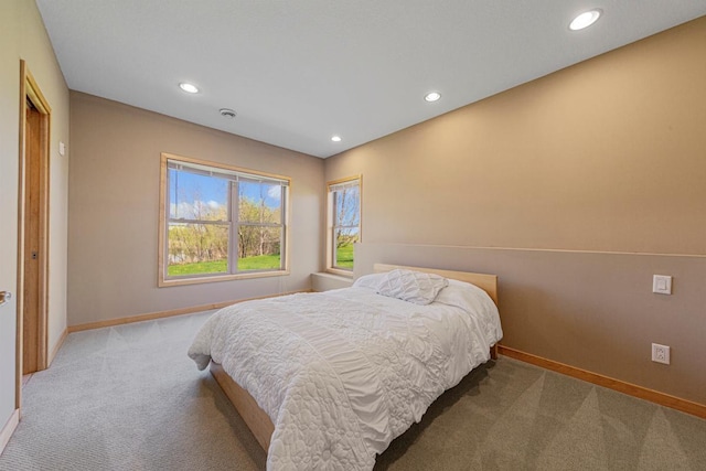carpeted bedroom with baseboards and recessed lighting