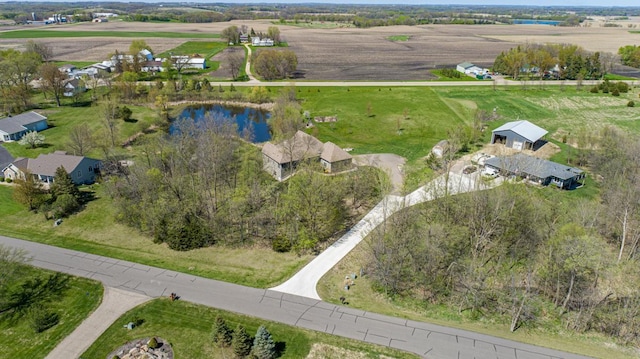 aerial overview of property's location featuring rural landscape and a large body of water