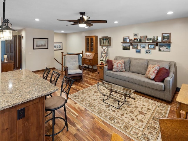 15015 Vermillion Cir NE, Andover, MN 55304 - living room with ceiling fan, wood finished floors, and recessed lighting