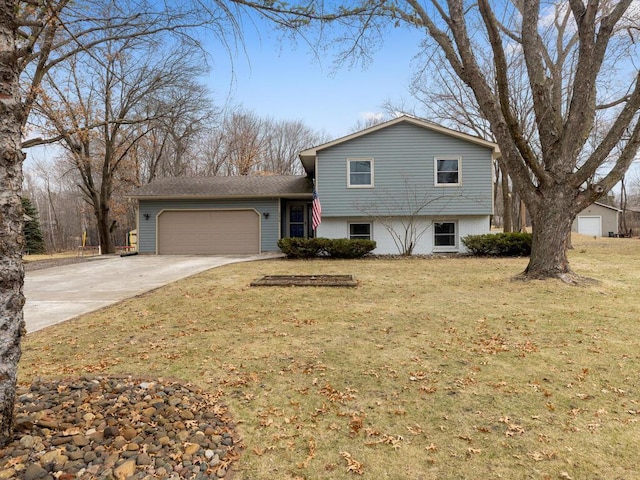 15015 Vermillion Cir NE, Andover, MN 55304 - tri-level home featuring a garage, driveway, and a front lawn