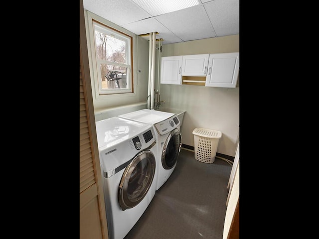15015 Vermillion Cir NE, Andover, MN 55304 - laundry room with independent washer and dryer, dark carpet, and cabinet space