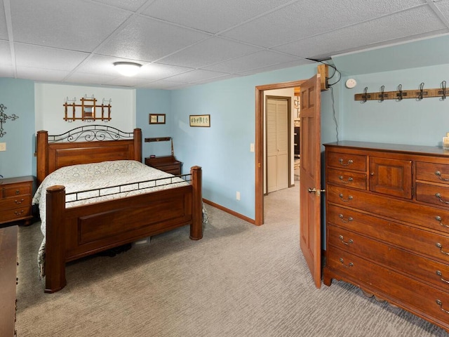 15015 Vermillion Cir NE, Andover, MN 55304 - bedroom featuring light colored carpet, a drop ceiling, and baseboards
