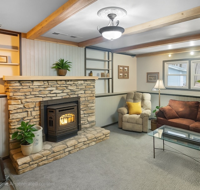 15015 Vermillion Cir NE, Ham Lake, MN 55304 - carpeted living room with beam ceiling, a wainscoted wall, and wood walls