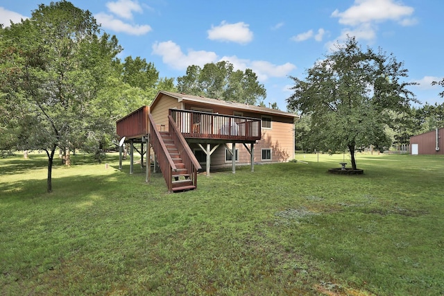 back of house featuring a wooden deck, stairs, and a yard