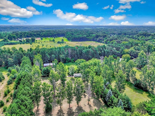 drone / aerial view with a view of trees