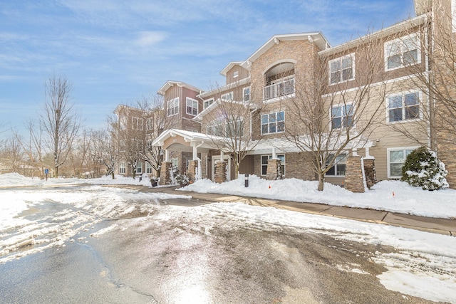 view of snow covered property