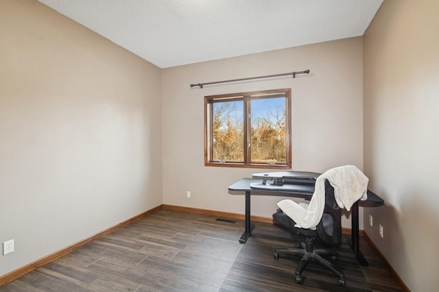 office with baseboards and wood finished floors