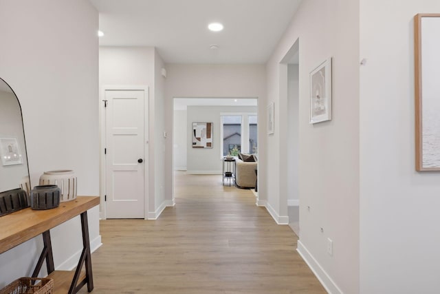 4640 Meadowview Ln, Minnetrista, MN 55331 - corridor featuring light wood finished floors and recessed lighting