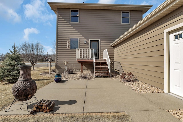 back of property with a patio area