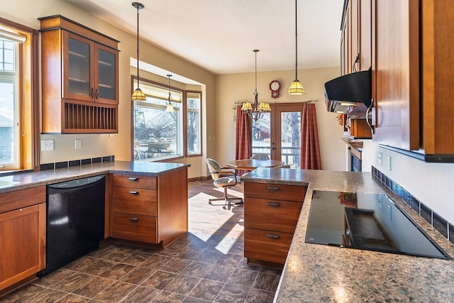 kitchen with under cabinet range hood, brown cabinets, a peninsula, and black appliances