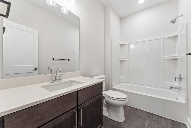 bathroom featuring toilet, bathtub / shower combination, and vanity