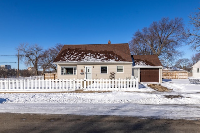 view of front of property with a fenced front yard and a chimney