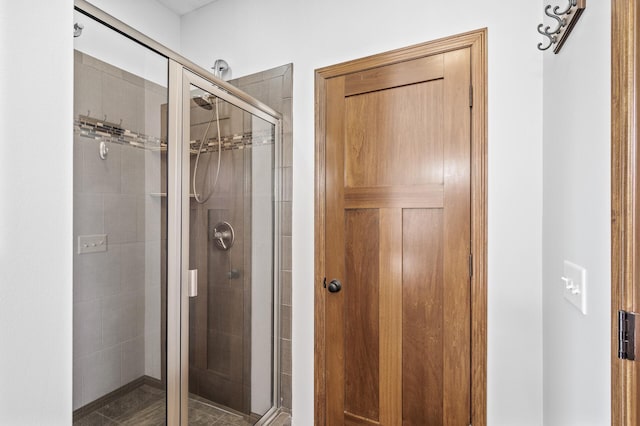 bathroom featuring a shower stall