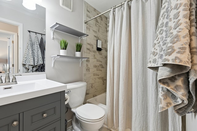 full bath featuring visible vents, toilet, vanity, and shower / bath combination with curtain