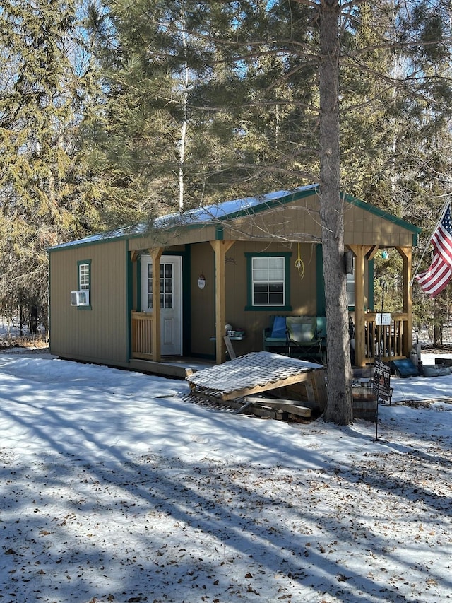 rustic home featuring cooling unit