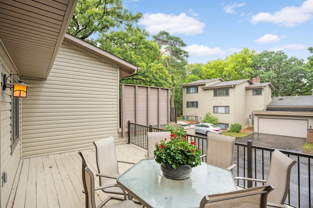 deck with outdoor dining space