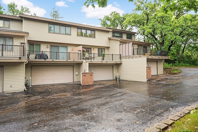 view of front of home featuring driveway and an attached garage