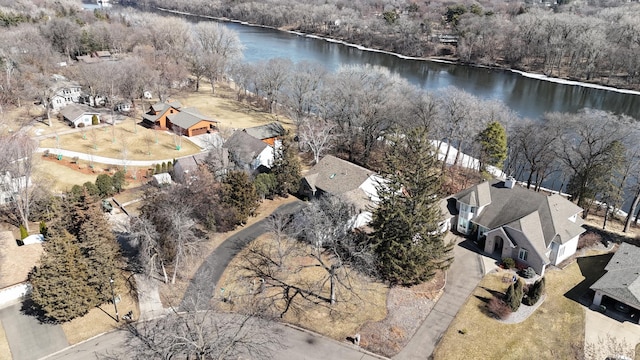 bird's eye view with a water view and a residential view