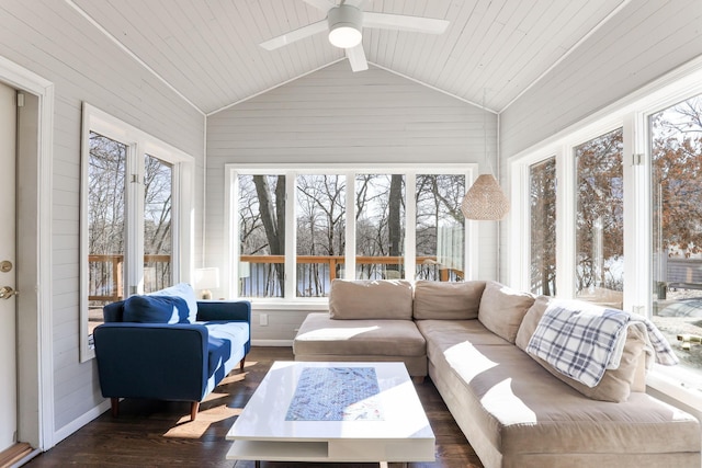 sunroom / solarium featuring ceiling fan and vaulted ceiling