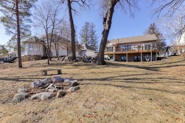 view of yard with a wooden deck