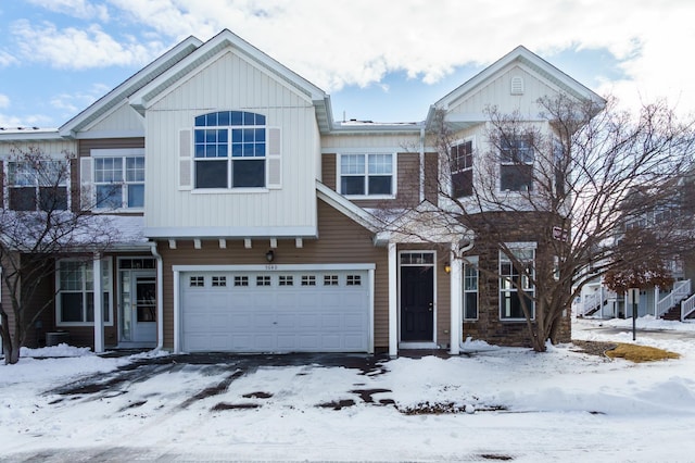 view of front of property with a garage