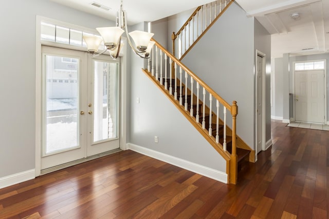 5640 Winnetka Ave N, New Hope, MN 55428 - foyer entrance featuring stairway, visible vents, and hardwood / wood-style flooring