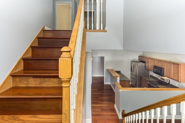 5640 Winnetka Ave N, New Hope, MN 55428 - stairs featuring baseboards and wood finished floors