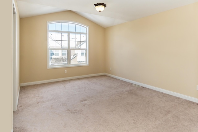 5640 Winnetka Ave N, New Hope, MN 55428 - carpeted empty room with baseboards and vaulted ceiling