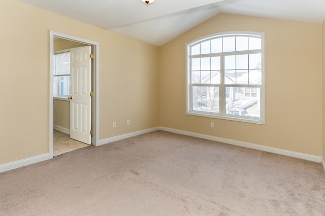 5640 Winnetka Ave N, New Hope, MN 55428 - carpeted spare room featuring a wealth of natural light, vaulted ceiling, and baseboards